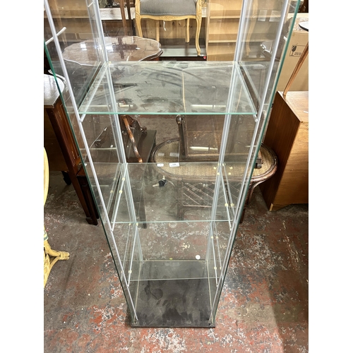 211 - A modern black ash effect and glass display cabinet - approx. 163cm high x 43cm wide x 37cm deep