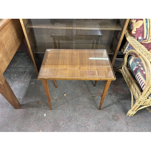 214 - Two pieces of mid 20th century teak furniture, one bookcase and one side table