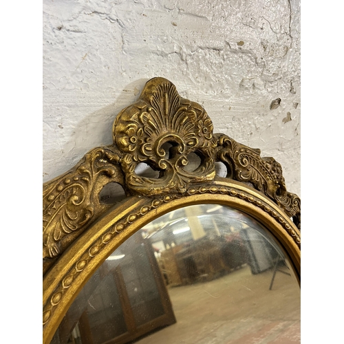 214A - A 19th century style gilt framed bevelled edge wall mirror - approx. 89cm high x 70cm wide