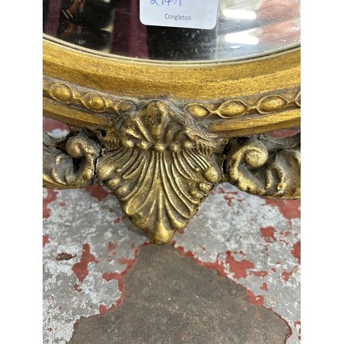 214A - A 19th century style gilt framed bevelled edge wall mirror - approx. 89cm high x 70cm wide