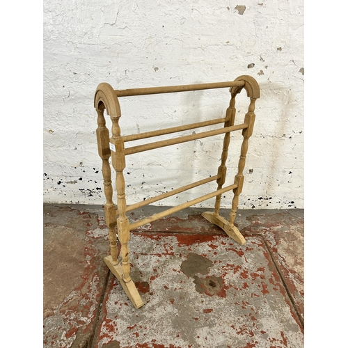 215 - A Victorian style beech towel rail