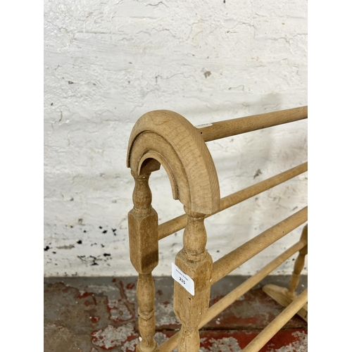 215 - A Victorian style beech towel rail