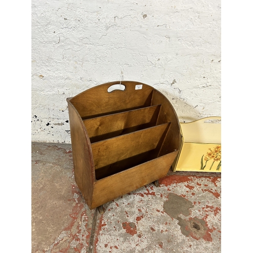 216 - Three magazine racks