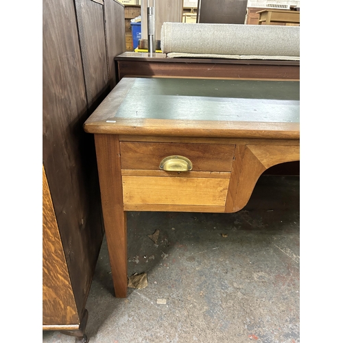 217 - A mid 20th century teak office desk - approx. 76cm high x 153cm wide x 83cm deep