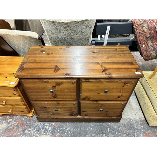 230 - A Ducal pine four drawer office filing cabinet - approx. 75cm high x 97cm wide x 44cm deep