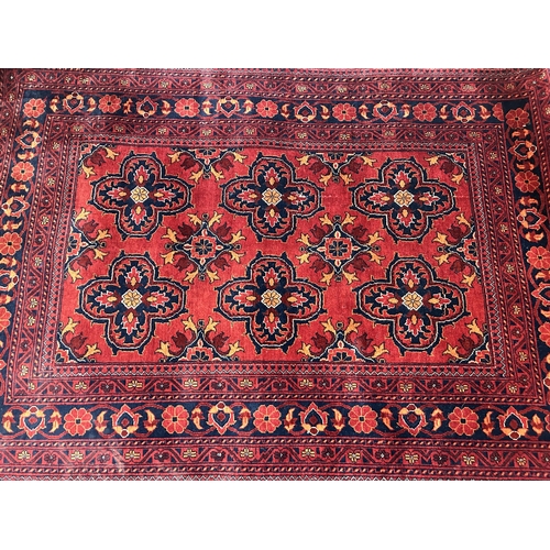 235A - A 20th century Afghan hand made rug, attributed to Khal Mohammadi - approx. 150cm x 100cm