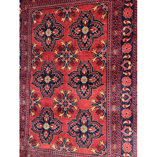 235A - A 20th century Afghan hand made rug, attributed to Khal Mohammadi - approx. 150cm x 100cm