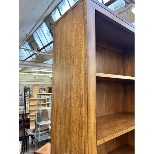 243 - A modern hardwood seven tier bookcase - approx. 222cm high x 81cm wide x 30cm deep