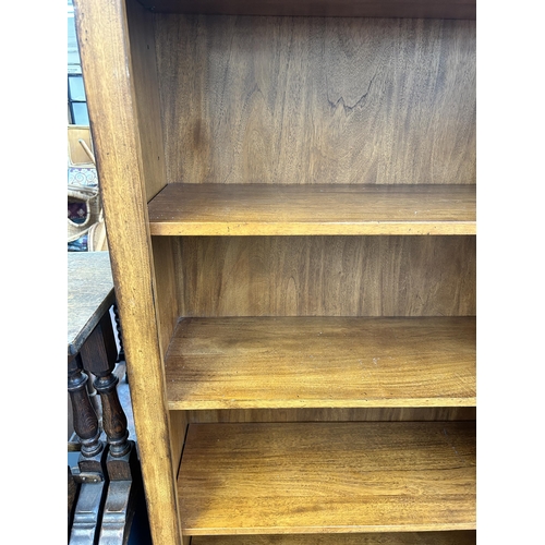 243 - A modern hardwood seven tier bookcase - approx. 222cm high x 81cm wide x 30cm deep