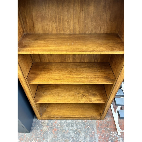 243 - A modern hardwood seven tier bookcase - approx. 222cm high x 81cm wide x 30cm deep