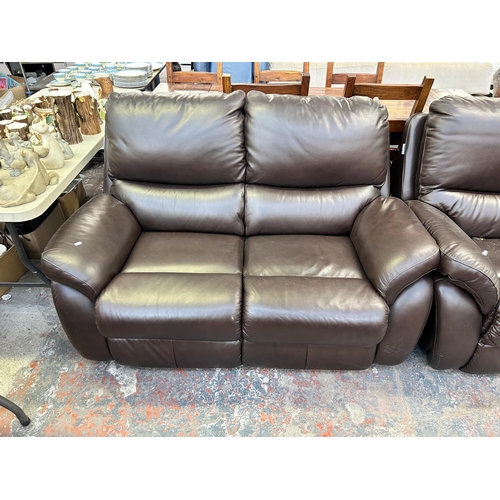 256 - A La-Z-Boy brown leather two piece lounge suite comprising electric reclining three seater sofa and ... 