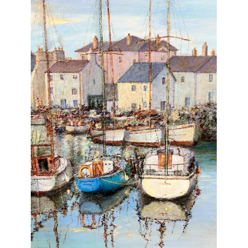 264 - A gilt framed oil on canvas of a harbour scene - approx. 56cm high x 67cm wide