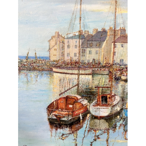 264 - A gilt framed oil on canvas of a harbour scene - approx. 56cm high x 67cm wide