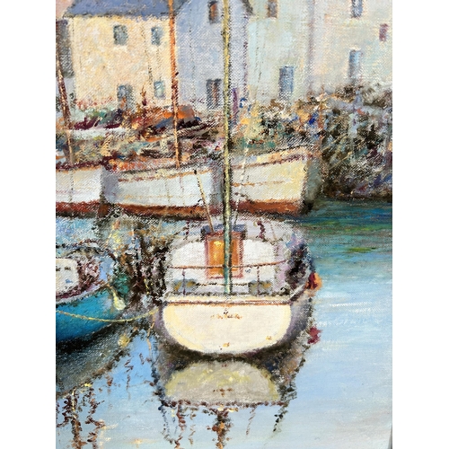 264 - A gilt framed oil on canvas of a harbour scene - approx. 56cm high x 67cm wide