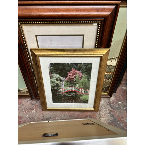 267 - A collection of framed pictures and mirrors