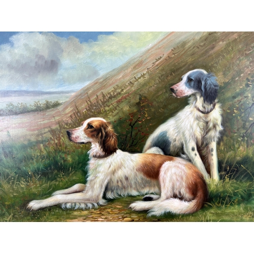 269 - A gilt framed oil on canvas of two German Longhaired Pointers, by Roy Grant - approx. 75cm high x 10... 