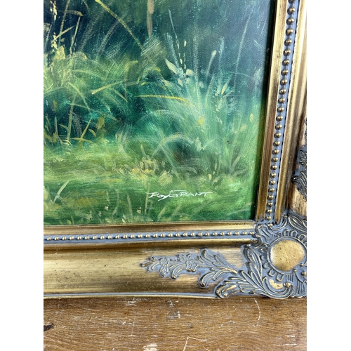 269 - A gilt framed oil on canvas of two German Longhaired Pointers, by Roy Grant - approx. 75cm high x 10... 