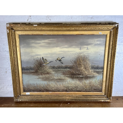 272 - A gilt framed Hugh Monahan (1914-1970) oil on board - approx. 82cm high x 107cm wide