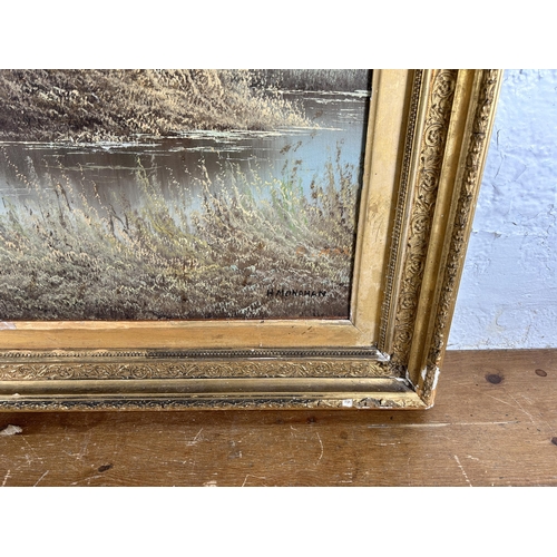 272 - A gilt framed Hugh Monahan (1914-1970) oil on board - approx. 82cm high x 107cm wide