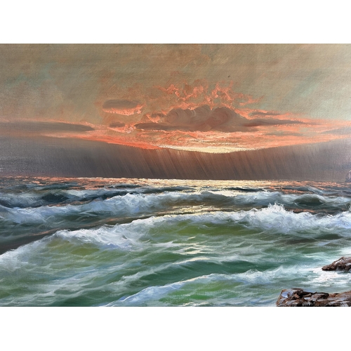 275 - A framed oil on canvas of a seascape, signed lower left - approx. 69cm high x 129cm wide