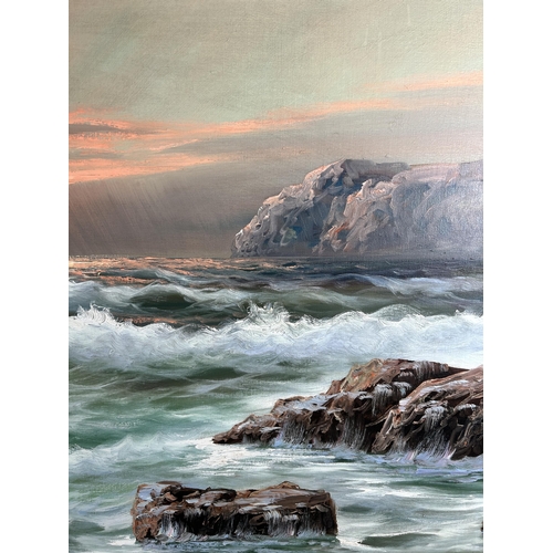 275 - A framed oil on canvas of a seascape, signed lower left - approx. 69cm high x 129cm wide