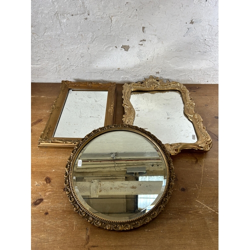 296 - Three gilt framed wall mirrors to include one 19th century example etc. - largest approx. 56cm high ... 