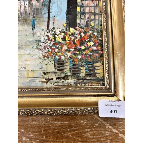 301 - Two gilt framed Parisian scene acrylic paintings on canvas - largest approx. 68cm high x 57cm wide