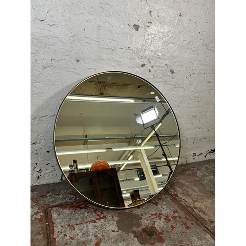 33 - A modern gilt framed circular wall mirror - approx. 80cm diameter