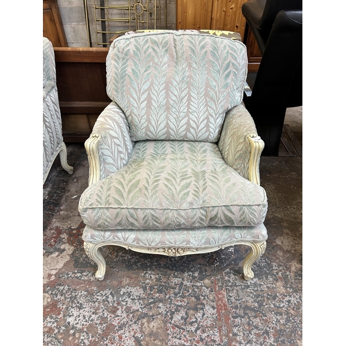 41 - A French style white painted and floral fabric upholstered armchair