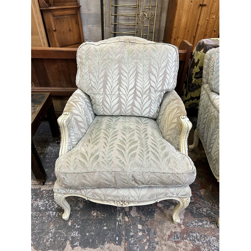 42 - A French style white painted and floral fabric upholstered armchair