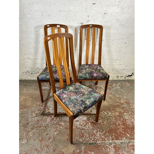 47 - Three mid 20th century teak and fabric upholstered dining chairs