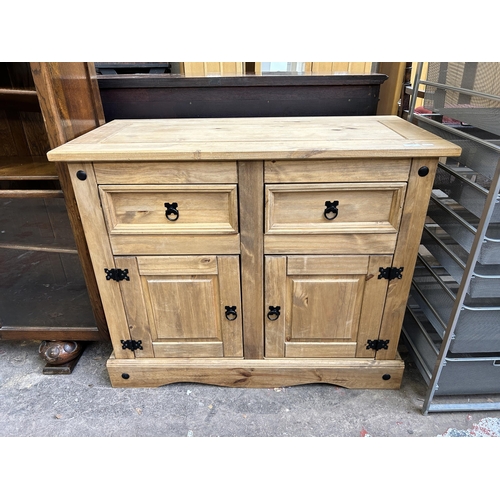52 - A Mexican pine sideboard - approx. 82cm high x 100cm wide x 48cm deep
