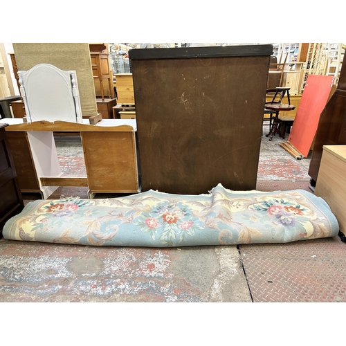 66 - A large floral pattern rug - approx. 310cm x 245cm