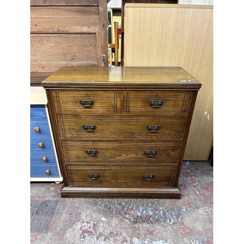 84 - A late 19th/early 20th century oak chest of drawers - approx. 110cm high x 106cm wide x 46cm deep