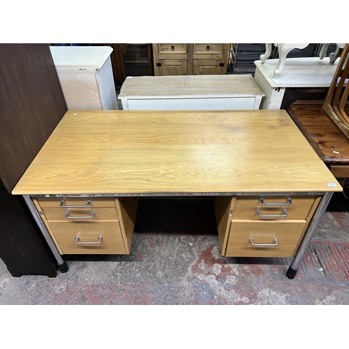 89 - A modern oak and chrome plated office desk - approx. 72cm high x 145cm wide x 80cm deep
