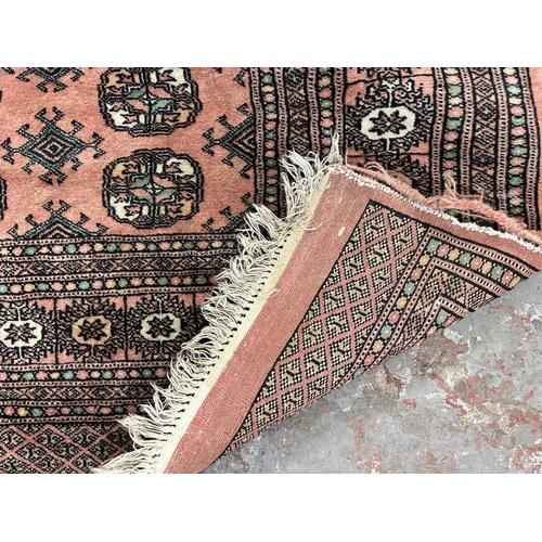 90 - A mid 20th century machine woven rug