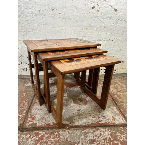 99 - A mid 20th century Keith Eatwell teak and tile top nest of tables - approx. 48cm high x 58cm wide x ... 