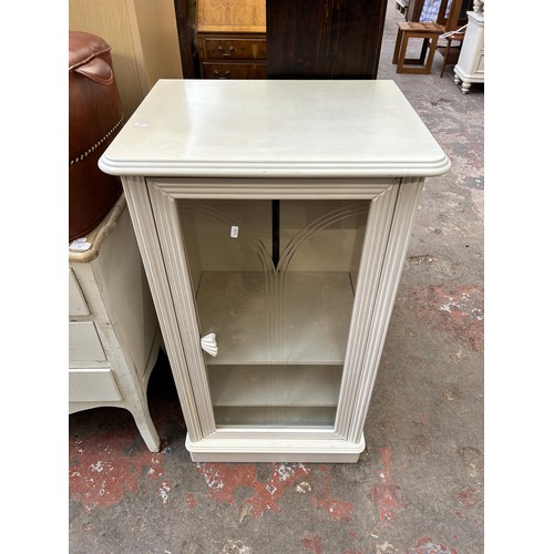 53 - A modern white painted stereo cabinet