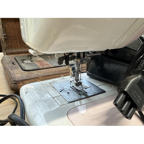 812 - A Janome New Home Harmony 2041 electric sewing machine with foot pedal