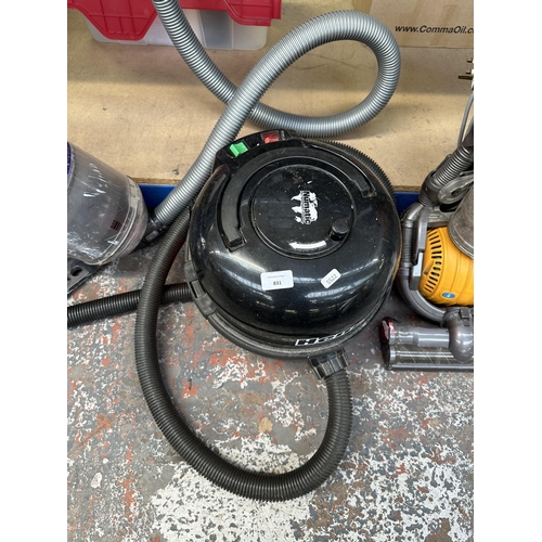 831 - A Numatic Henry cylinder vacuum cleaner