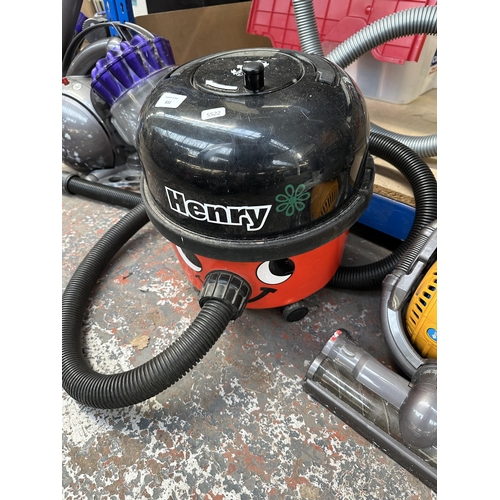 831 - A Numatic Henry cylinder vacuum cleaner