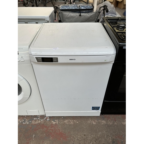 845D - A Beko DW80323W A++ class 60cm dishwasher