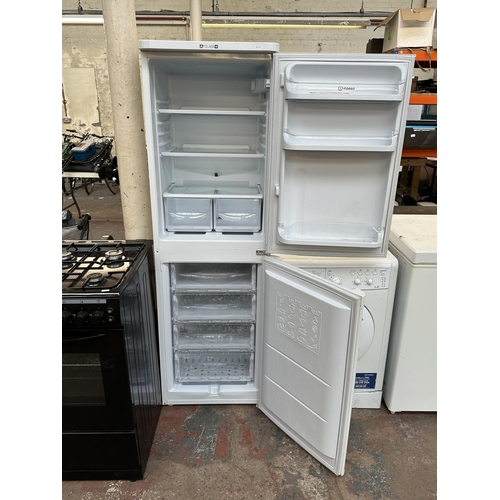 845F - An Indesit A+ class upright fridge freezer - approx. 173cm high