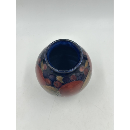 309 - A Moorcroft Pomegranate pattern vase - approx. 10.5cm high