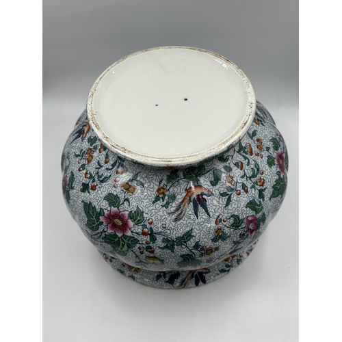 318 - A late 19th/early 20th century hand decorated ceramic jardiniere - approx. 26cm high x 34cm diameter