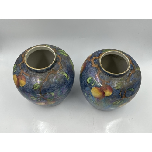 319 - A pair of Grimwades Byzanta Ware vases - approx. 18cm high