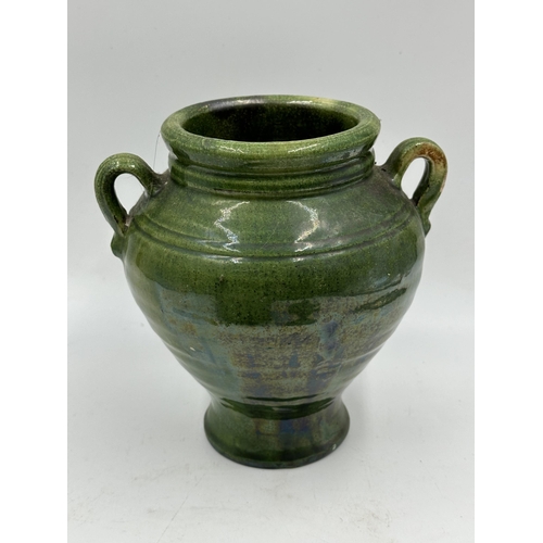 333 - Two mid 20th century green glazed terracotta vases, one Spanish Tito Ubeda and one other