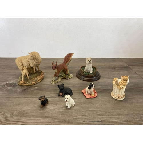 343 - A collection of resin animal figurines to include Country Artists, Aynsley MasterCraft, Teviotdale e... 