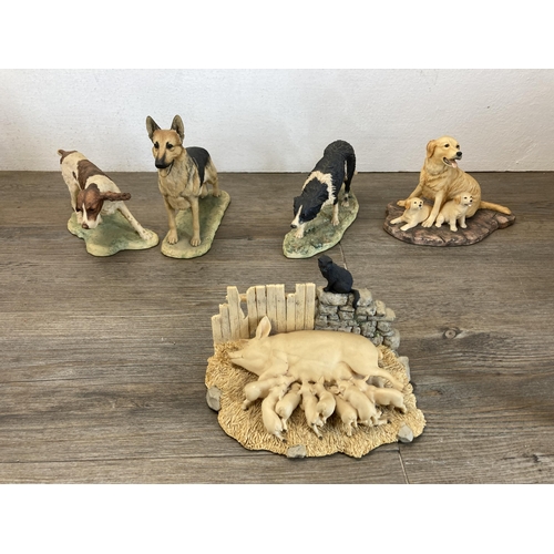 345 - A collection of Border Fine Arts resin animal figurines