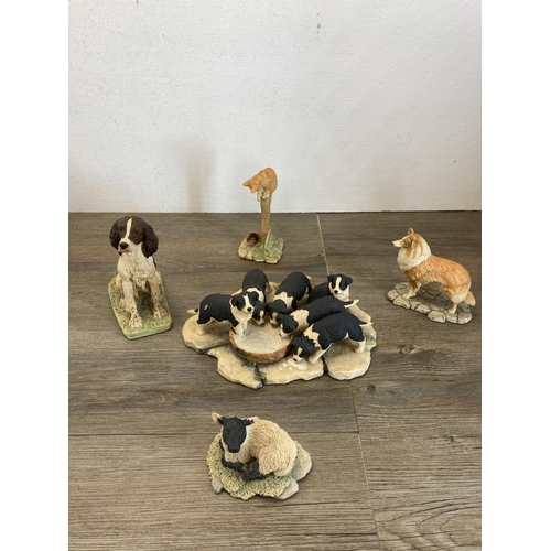 345 - A collection of Border Fine Arts resin animal figurines